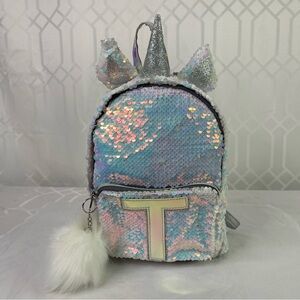 Justice Backpack features A Playful Unicorn Design With A Fluffy Horn And Ears.